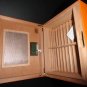 Brizard Airflow Humidor in Racing Orange Leather Measures 14" L x 11" W x 5" H