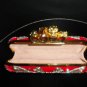 Alexander McQueen Red Jeweled knuckle clutch