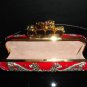 Alexander McQueen Red Jeweled knuckle clutch