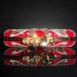 Alexander McQueen Red Jeweled knuckle clutch