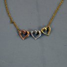 Three Hearts on a Chain Pendant 10K Yellow, White, and Rose Gold