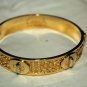 Coach Gold Turnlock Bangle
