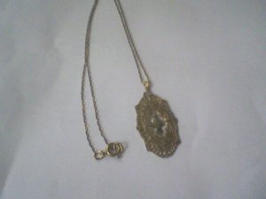vintage gold necklace with tiny diamond