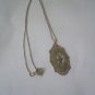 vintage gold necklace with tiny diamond