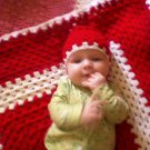red and white baby blanket