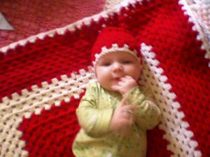 red and white baby blanket