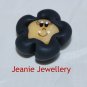 Black flower magnet