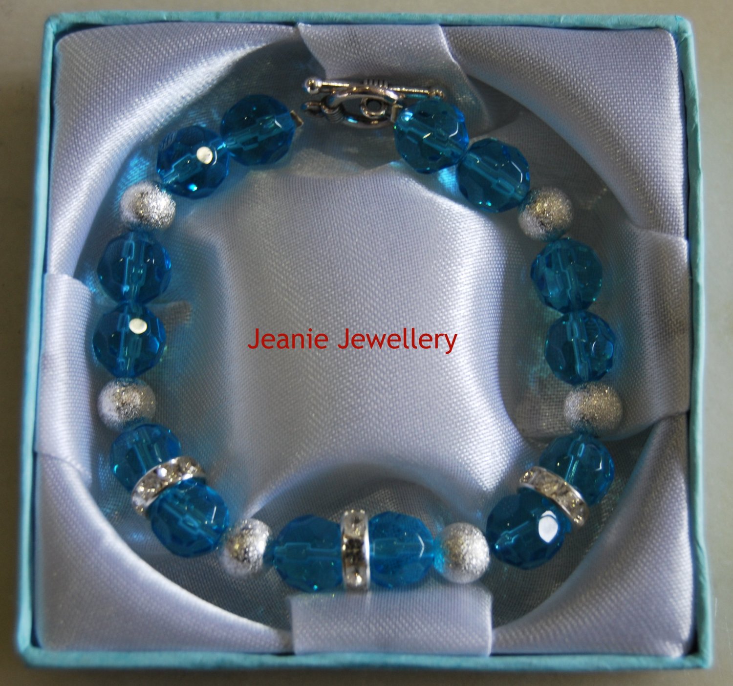 Light Blue Glass Bead Bracelet with Stardust and Rhynestone
