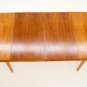 Danish Mid Century Modern Walnut Dining Table w/2 pop up Leafs.
