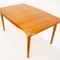 Danish Mid Century Modern Walnut Dining Table w/2 pop up Leafs.
