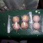Six Small Wooden Doll Heads