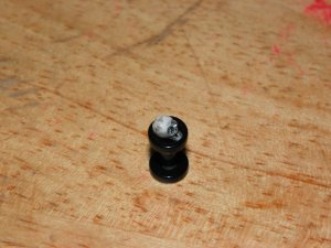 Black 8 Gauge Skull Plug White Eyes 36