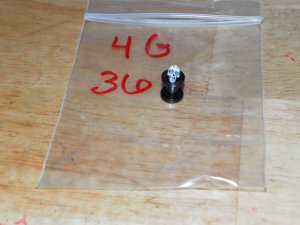 Black 4 Gauge Skull Plug White Eyes 36