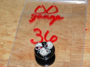 Black 00 Gauge Skull Plug Red Eyes 36