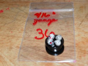 Black 9/16" Skull Plug Red Eyes 36