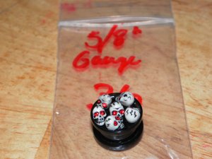 Black 5/8" Skull Plug Red Eyes 36