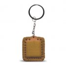 5 cm key ring with a leather pouch holding a book of Tehillim