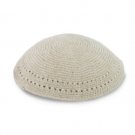 16.5 cm knitted kippah in cream with crocheted peepholes