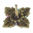 Brass Finished Flower Shaped Dreidel with Jeweled Base