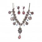 Silver and Shades of Red Earrings and Pendant Set with Hamsa