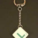 Keyring Scrabble Tile. Green on Cream Tile. Letter L