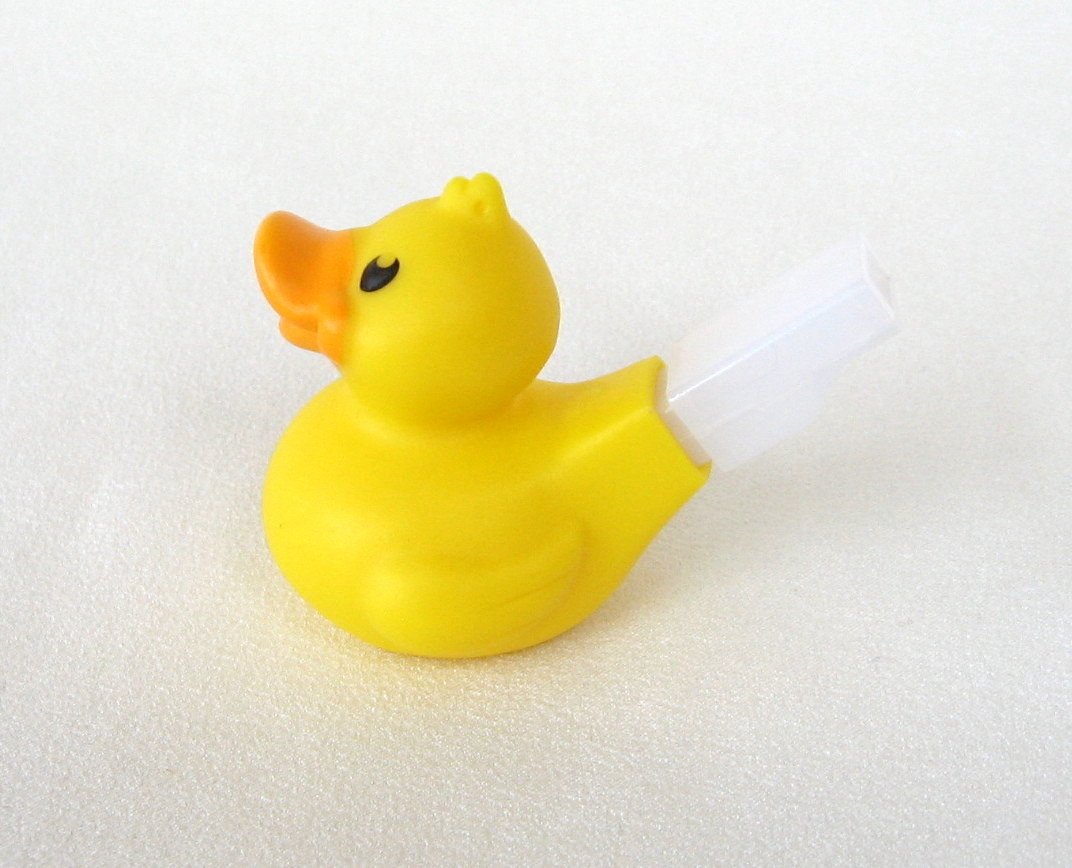 Mini Yellow Duck Quacker Whistle Toy By Schylling