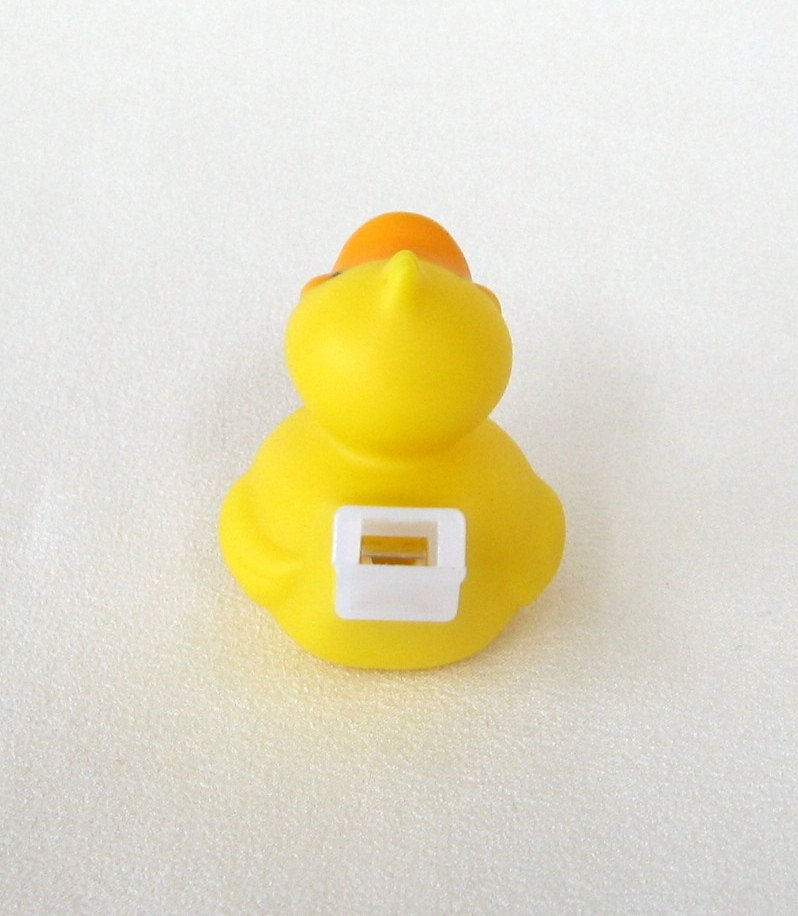 Mini Yellow Duck Quacker Whistle Toy By Schylling