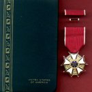 Legion of Merit medal in case with ribbon bar and lapel pin Legion of Merit medal in case with ribbon bar and lapel pin