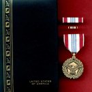 US Defense Meritorious Service medal in case with ribbon bar and lapel pin