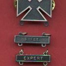 Marksman badge with three qualification bars