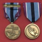 Humanitarian Service Award medal with ribbon bar