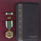 US Navy Commendation medal with ribbon bar and lapel pin in case