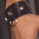 Leather wrist cuffs with square nail heads and O rings