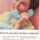 1959 Bell Telephone: Reach for your phone and have a happy time.
