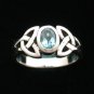STERLING SILVER CELTIC TRISKELE RING WITH BLUE TOPAZ