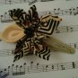 yellow and black hair clip