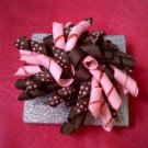 Pink and brown curly