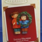 Little Helpers Hanging the Wreath