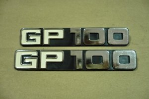 Genuine Suzuki GP100 Emblem Side Cover NOS