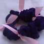 purple velour scrunchie with pink ribbon