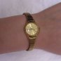 Vintage Timex base metal bezel stainless steel back stretch band ladies wat