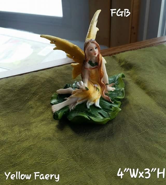 Yellow faery statue