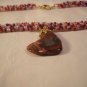 Red heart on spiral rope