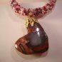 Red heart on spiral rope
