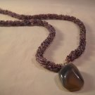 Purple agate on spiral rope