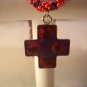Red and purple cross on spiral rope