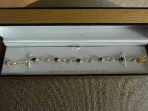 Stunning 18K gold over SS genuine sapphire and diamond accent bracelet