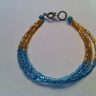 Blue and Gold Bead Bracelet