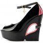black patent leather with lovely eye pattern embellished high heel shoes