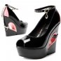 black patent leather with lovely eye pattern embellished high heel shoes